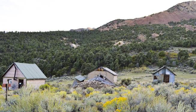 Old homes, the remains of a ghost town near the Morey mine in northern Nye County, are shown on Sept. 16, 2013. The area has been vacant since the 1930s, and several structures were damaged by a nearby nuclear test in 1968.