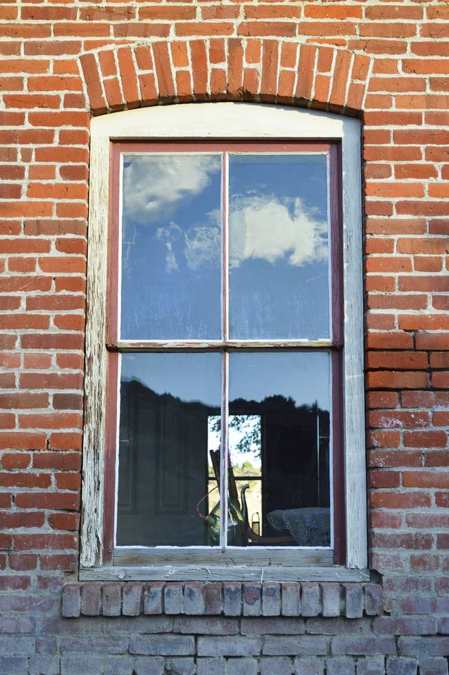 An interior and exterior view of an old brick building in Belmont, NV, Tuesday, Sept. 17, 2013.