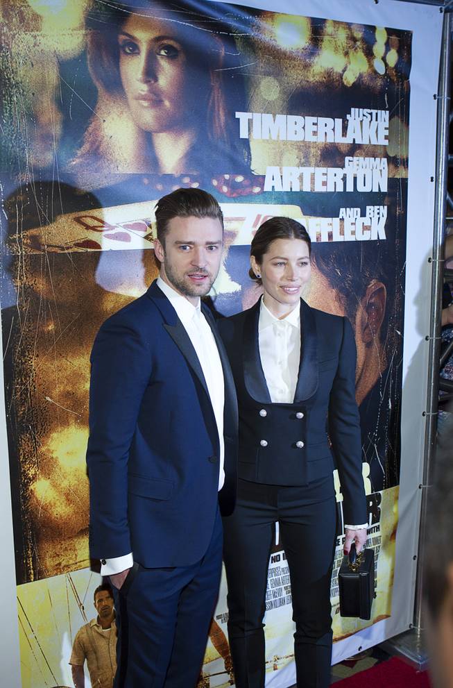 Singer/actor Justin Timberlake and his wife, actress Jessica Biel, arrive for the world premiere of the Twentieth Century Fox and New Regency film "Runner Runner" at Planet Hollywood on Wednesday, Sept. 18, 2013.