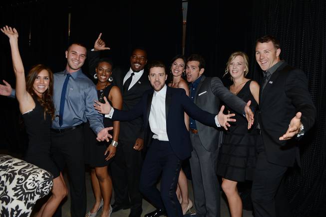 Justin Timberlake, center, with members of the USO at the ...
