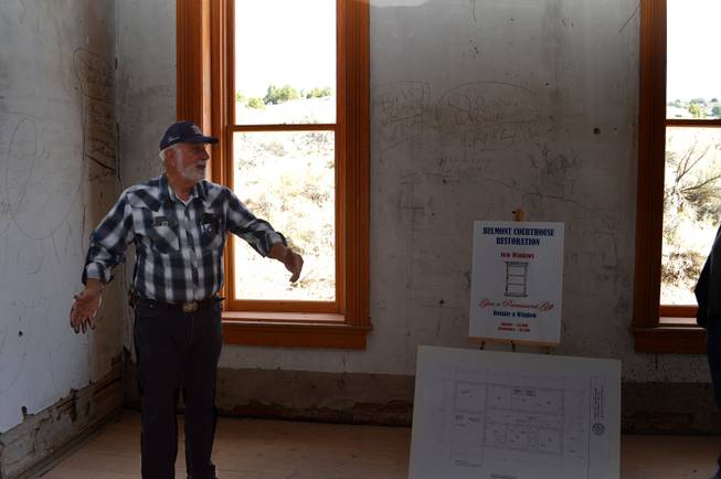 Retired schoolteacher Terry Terras gives a tour of the historic Belmont Courthouse, which is being revamped.