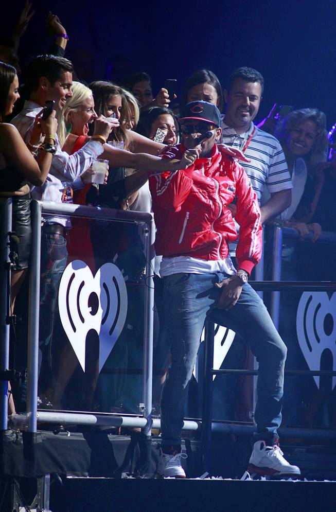 Chris Brown performs during the iHeartRadio Music Festival at the MGM Grand Garden Arena Friday, Sept. 20, 2013.