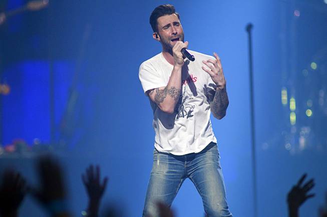 Maroon 5 lead singer Adam Levine performs during the 2013 iHeartRadio Music Festival at MGM Grand Garden Arena on Saturday, Sept. 21, 2013.