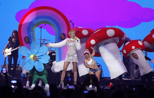 Miley Cyrus performs during the 2013 iHeartRadio Music Festival at MGM Grand Garden Arena on Saturday, Sept. 21, 2013.
