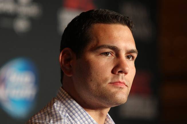 Chris Weidman listens to a question during a news conference to promote his December fight against Anderson Silva at UFC 168 Tuesday, Sept. 24, 2013.