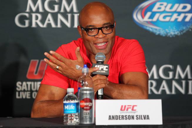 Anderson Silva answers a question during a news conference to promote his December fight against Chris Weidman at UFC 168 Tuesday, Sept. 24, 2013.