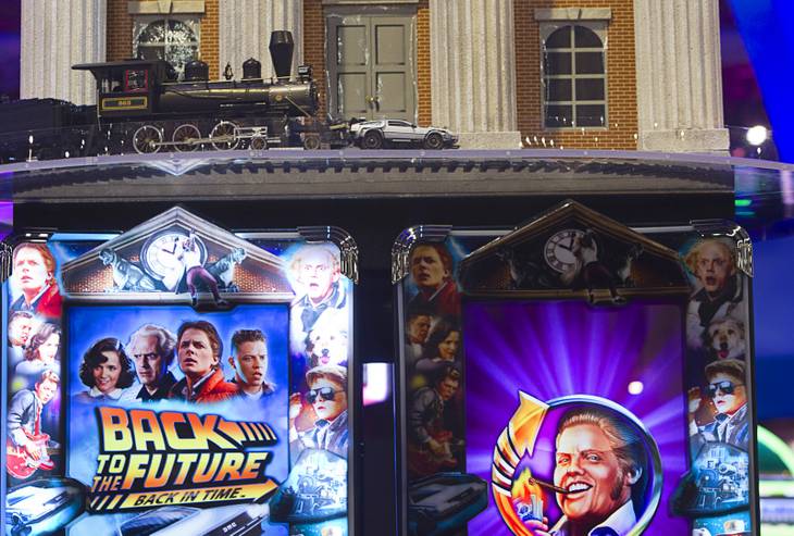 "Back to the Future" video slot machines by IGT are crowned by a circular run of train tracks with a model locomotive pushing a DeLorean time machine during the G2E convention at the Sands Expo Center Wednesday, Sept. 25, 2013. 