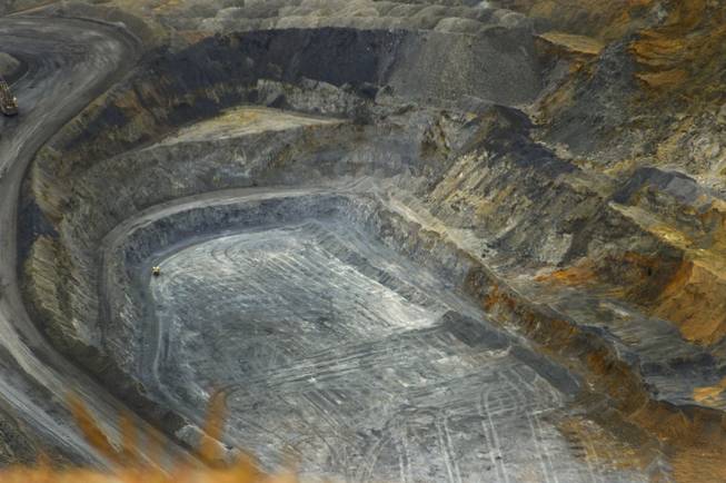 An open gold mine owned by Newmont Mining Corp., west of Elko, is shown on Sept. 26, 2013. This photo was taken right before a blast in the area.