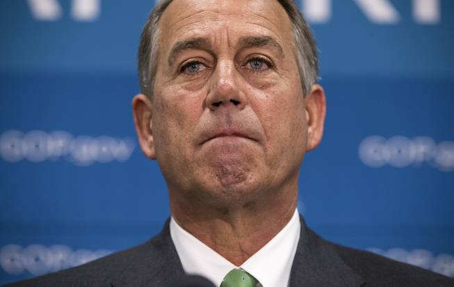 House Speaker John Boehner of Ohio speaks to reporters on Capitol Hill on Thursday, Sept. 26, 2013, after a closed-door strategy session.