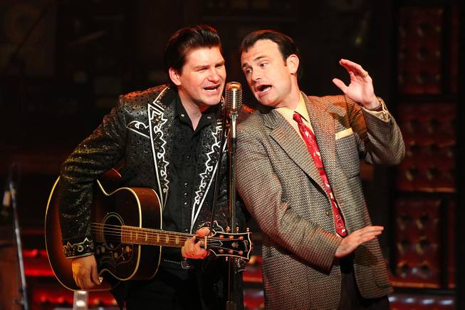 Benjamin Hale performs as Johnny Cash and Marc Donovan performs as Sam Phillips  during the Million Dollar Quartet show at Harrah's Tuesday, Oct. 1, 2013.