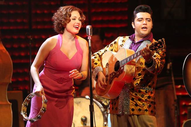 Felice Garcia performs as Dyanne and Cole performs as Elvis Presley during the Million Dollar Quartet show at Harrah's Tuesday, Oct. 1, 2013.