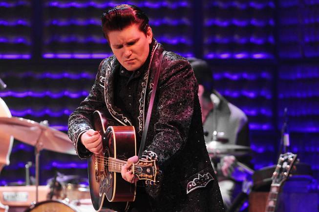 Benjamin Hale performs as Johnny Cash during the Million Dollar Quartet show at Harrah's Tuesday, Oct. 1, 2013.