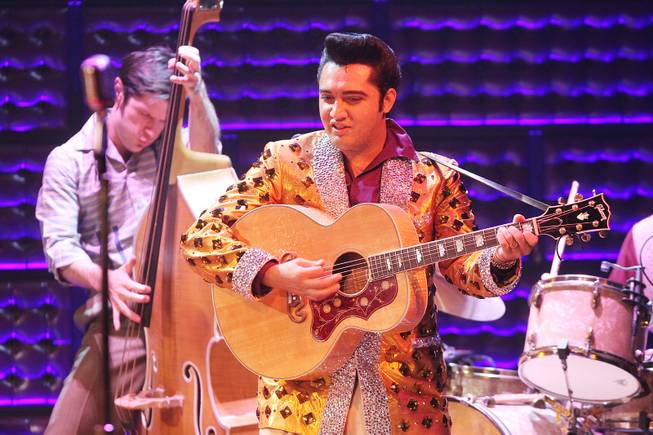 Cole performs as Elvis Presley during the Million Dollar Quartet show at Harrah's Tuesday, Oct. 1, 2013.