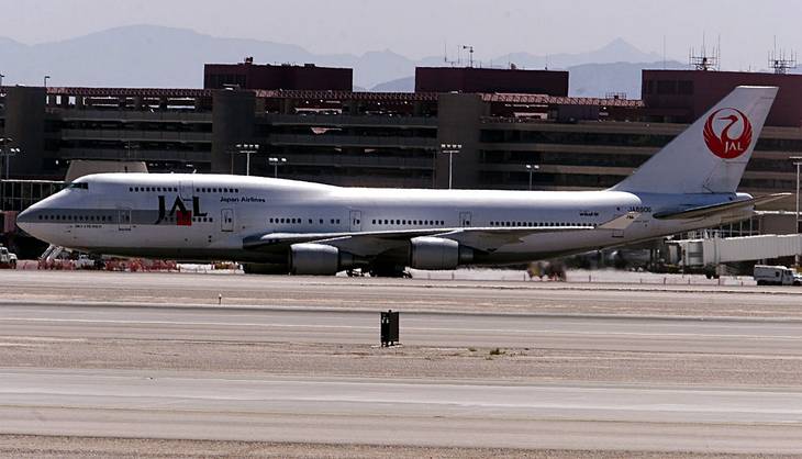A Japan Airlines jet taxis to a gate at McCarran International Airport on Friday, July 7, 2000.