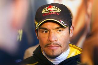 Mexican boxer Juan Manuel Marquez arrives at the Wynn Las Vegas Resort Tuesday, Oct. 8, 2013. Marquez will challenge undefeated WBO welterweight champion Timothy Bradley Jr. at the Thomas & Mack Center Saturday.