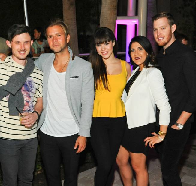 Claire Sinclair, center, and guests at “A Night of Cocktails ...