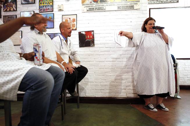 Miss Appropriate, right, leads the bachelorette dating game during a Big Beautiful Women night at the Heart Attack Grill in downtown Las Vegas on Tuesday, October 8, 2013.