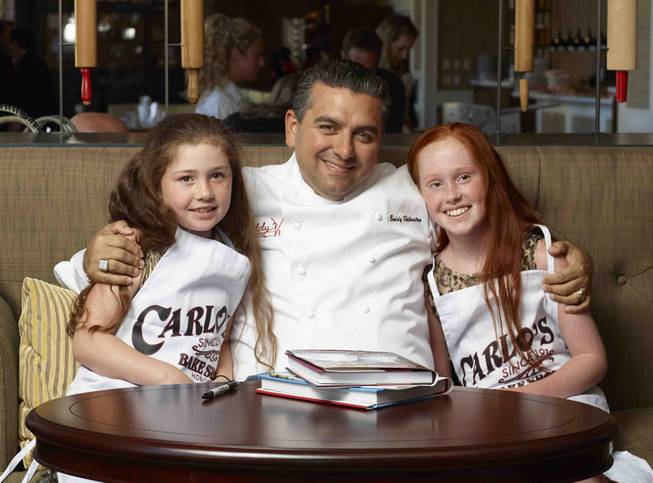 Buddy Valastro and two kids.