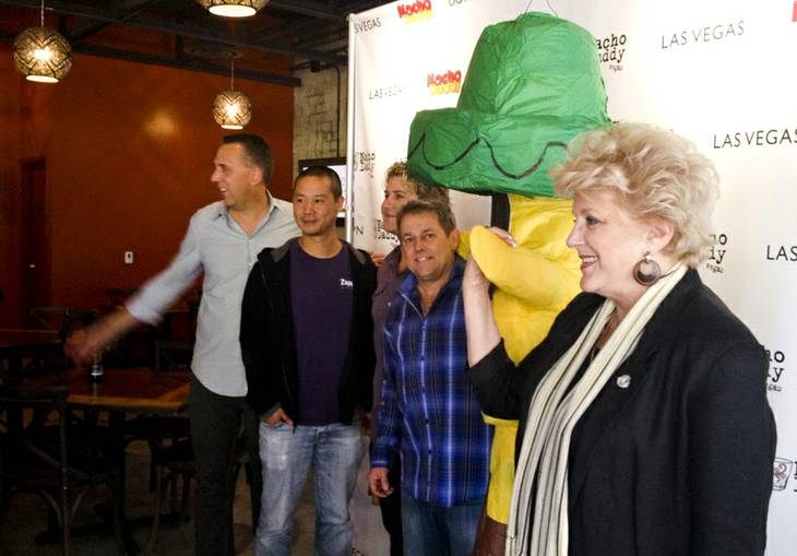 Mayor Carolyn Goodman, foreground, joins the four Nacho Daddy investors —from left, Fred Mossler, Tony Hsieh, Paul Hymas and Keith Glynn — at a ribbon cutting for the new restaurant, 115 N. 4th St. downtown.
