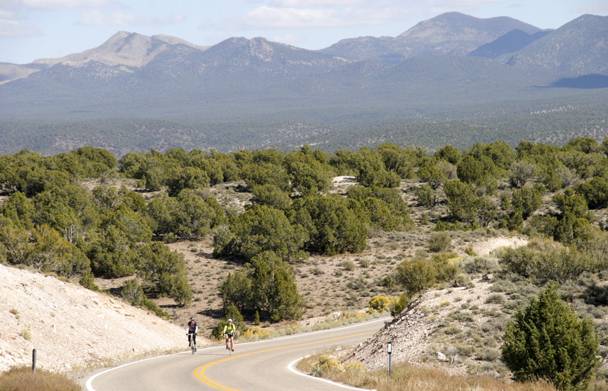Bicyclists pedal a section of state highway in a mountainous part of Lincoln County, Saturday, Oct. 12, 2013