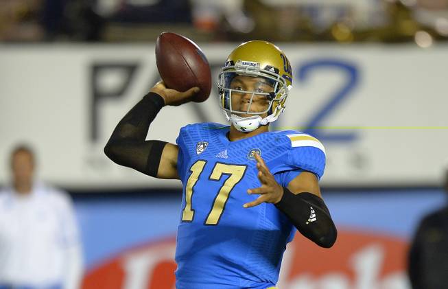 UCLA quarterback Brett Hundley passes during the first half of the Bruins' game against California on Saturday, Oct. 12, 2013, in Pasadena, Calif.