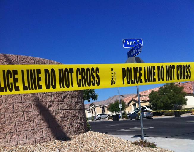 Police cordoned off a neighborhood in North Las Vegas near Ann Road and Via Victoria Street after a shooting and suicide Saturday, Oct. 12, 2013.