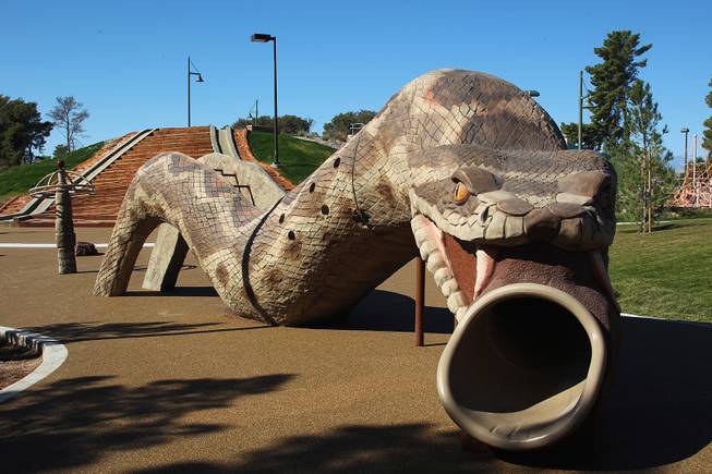 A snake tunnel and concrete slides are seen at the soon to open Craig Ranch Park in North Las Vegas Tuesday, October 15, 2013,