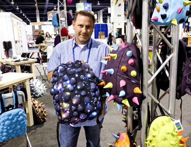 Phoenix-based MadPax showed several lines of backpacks at the ABC Kids Expo at the Las Vegas Convention Center, Tuesday, Oct. 15, 2013.