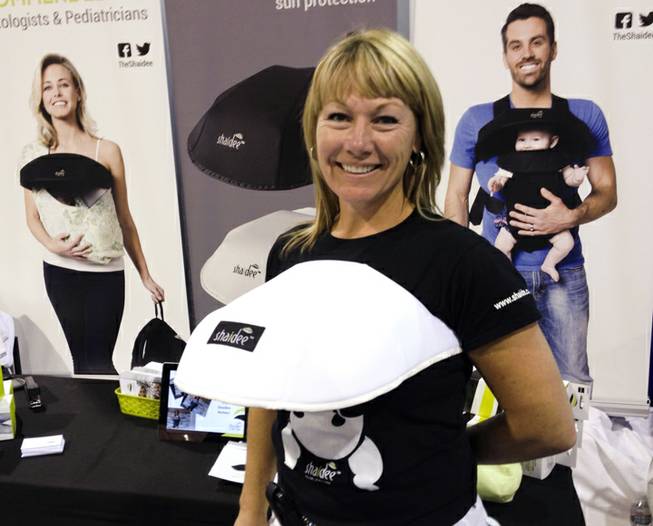 Jane Klugman, CEO of Kitchener, Ontario-based Shaidee Sun Cover displayed her companys lightweight, soft and flexible sun covers at the ABC Kids Expo at the Las Vegas Convention Center, Tuesday, Oct. 15, 2013.