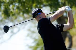 Charley Hoffman tees off during the Shriners Hospital for Children Open pro-am tournament Wednesday, Oct. 16, 2013.