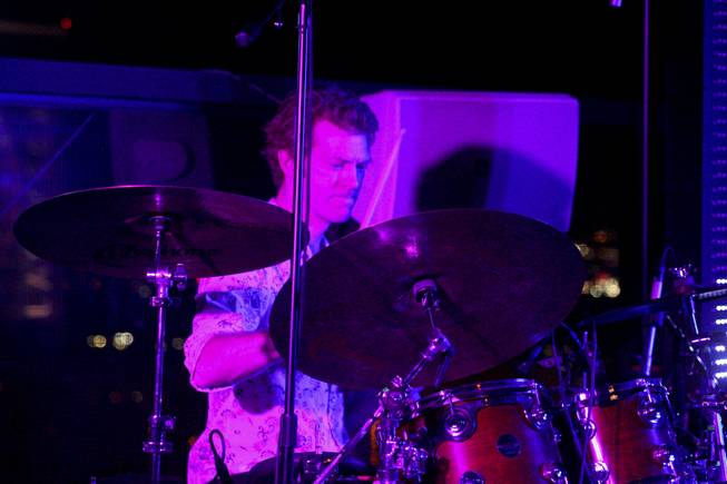Pat Gray on drums during local band Moksha's set at the "Rooftop Fall Ball 3" on the Binion's Gambling Hall & Hotel rooftop pool deck, Friday, Oct. 18, 2013.