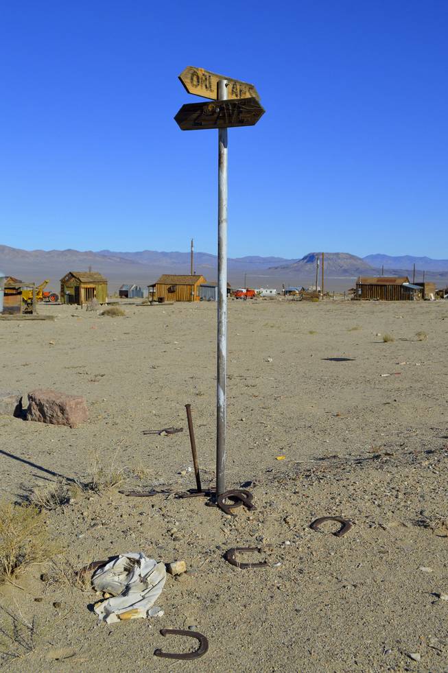 A street corner features horseshoes in Gold Point, which is south of Goldfield, NV, Tuesday, Oct. 22, 2013. The town has 10 year-round residents, if you count three who live outside of what's considered town limits.