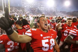 UNLV lineman Brian Roth celebrates the Rebels 27-22 victory over UNR Saturday, Oct. 26, 2013 at Mackay Stadium in Reno.