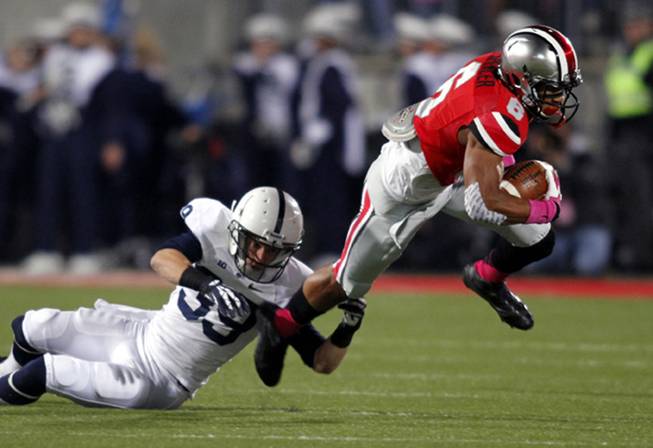 Ohio State receiver Evan Spencer, right, tries to get past Penn State safety Jesse Della Valle during an NCAA college football game Saturday, Oct. 26, 2013, in Columbus, Ohio. Ohio State beat Penn State 63-14. 