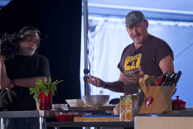 Chef Donald Link creates a meal on the East Stage during the Life is Beautiful Festival in downtown Las Vegas Sunday, Oct. 27, 2012.
