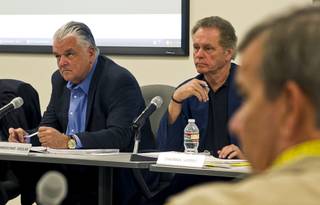 (From left) Commissioners Steve Sisolak and James Hammer with Sheriff Doug Gillespie listen to the details of a lawsuit settlement during a fiscal affairs committee meeting at the Metro Police headquarters Monday, Oct. 28, 2013.