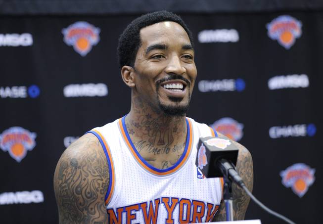 New York Knicks' J.R. Smith talks to the media at the NBA teams media day Monday, Sept. 30, 2013, in Greenburgh, N.Y. 