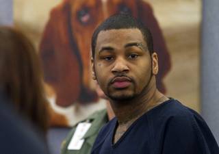 Ammar Harris, the suspect the Feb. 21 Las Vegas Strip shooting and car crash that killed three people, appears in court at the Regional Justice Center Wednesday, Oct. 30, 2013.