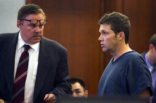 Benjamin Frazier, 41, speaks to Judge Cynthia Cruz during a court appearance at the Regional Justice Center Wednesday, Oct. 30, 2013. Attorney Bob Beckett listens at left. Frazier is accused of shooting two security guards and a patron outside the Drai's after-hours club in Bally's on Oct. 21, 2013.