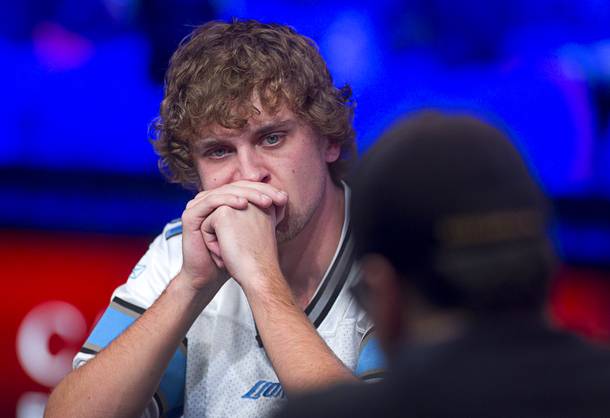 Ryan Riess, 23, a poker professional from East Lansing, Michigan who now resides in Las Vegas, competes across from Jay Farber during the final table of the World Series of Poker $10,000 buy-in no-limit Texas Hold 'Em tournament at the Rio Monday, Nov. 4, 2013.