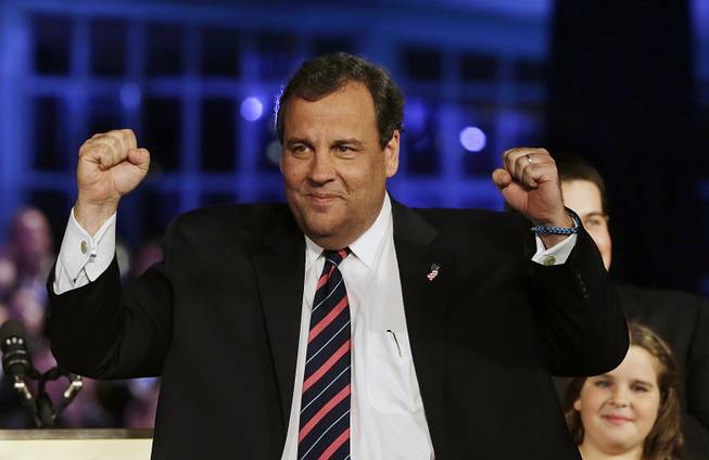 Republican New Jersey Gov. Chris Christie celebrates his election victory in Asbury Park, N.J., Tuesday, Nov. 5, 2013, after defeating Democratic challenger Barbara Buono. 