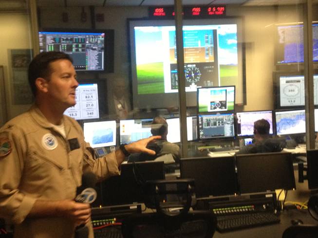 A Global Hawk pilot explains how the control room for unmanned aerial systems at NASA’s Dryden Flight Research Center at Edwards Air Force Base works. Pilots use a joystick or mouse to fly drones.