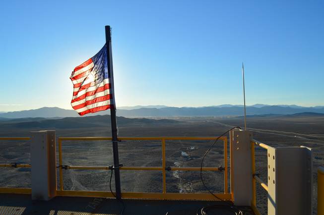 An American flag at the top of the headframe of the Nevada Copper mine outside of Yerington is shown on Oct. 23, 2013.