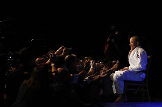 Georges St. Pierre answers questions during the publicity workout for UFC 167 Wednesday, Nov. 13, 2013 at the MGM Grand.