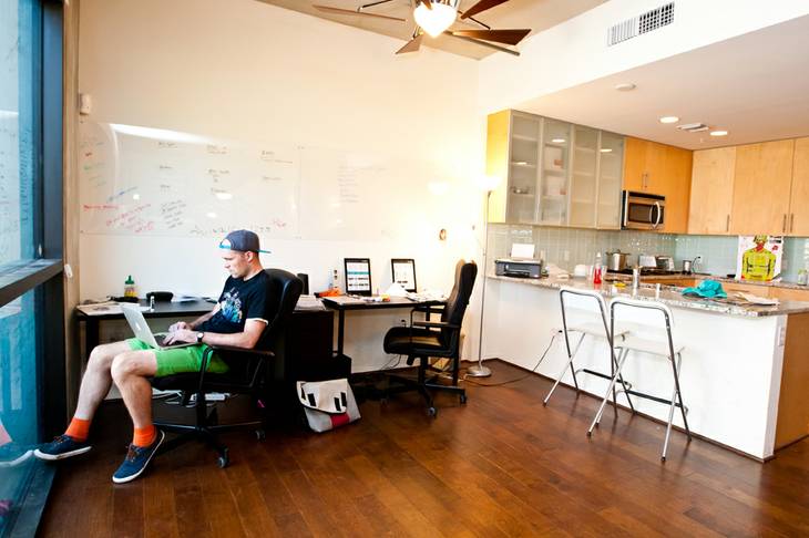 While his team is working in the field, CEO Austin Hackett concentrates on his work in their office space at CrowdHall located at 353 East Bonneville Aveue, Suite 752, in Las Vegas Monday, November 11, 2013.