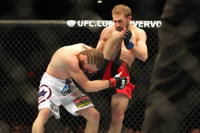 Ali Bagautinov lands a kick to the head of Tim Elliott during their fight at UFC 167 Saturday, Nov. 16, 2013 at the MGM Grand Garden Arena.