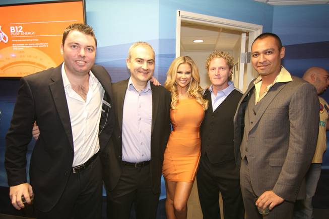 Jessa Hinton is flanked by Reviv owners German Kaupert, Dr. Raanan Pokroy, Dr. Andrew Garff and Dr. Johnny Parvani at MGM Grand.