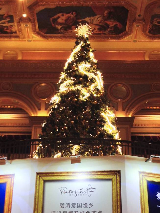 A Christmas tree overlooks the casino floor at Venetian Macau Tuesday, Nov. 2013. Take a.picture from this vantage point, and you will be in trouble.