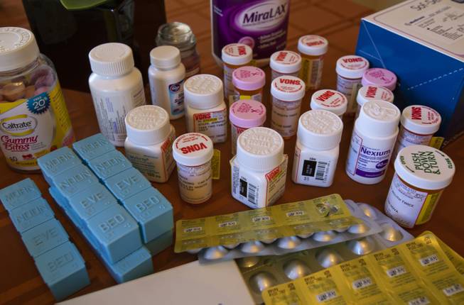 A view of Jenny Stiles' numerous prescribed medicines due to her many ongoing lifelong ailments Wednesday, Nov. 20, 2013.  Jenny is on the kidney transplant list for the second time.