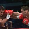 Julio Cesar Chavez and Oscar de la Hoya, left, exchange punches during their World Boxing Council Welterweight Championship bout at the Thomas & Mack Center in Las Vegas, Friday, Sept. 18, 1998. 